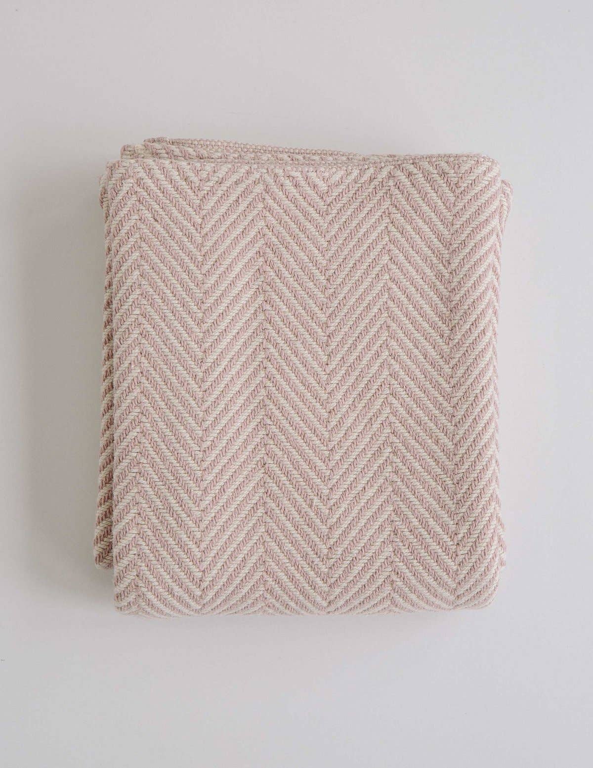 herringbone stitch pattern on baby blanket in blush color