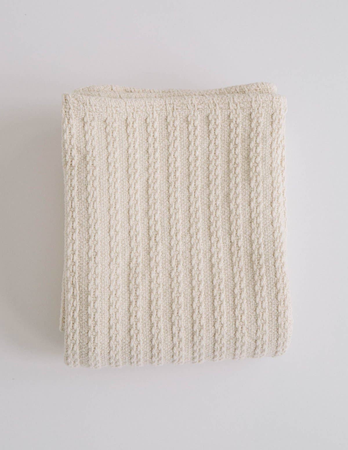 cable knit baby blanket in natural color
