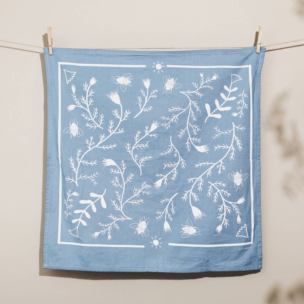 Thistle tea towel made in the USA by Elana Gabrielle hanging on a wire