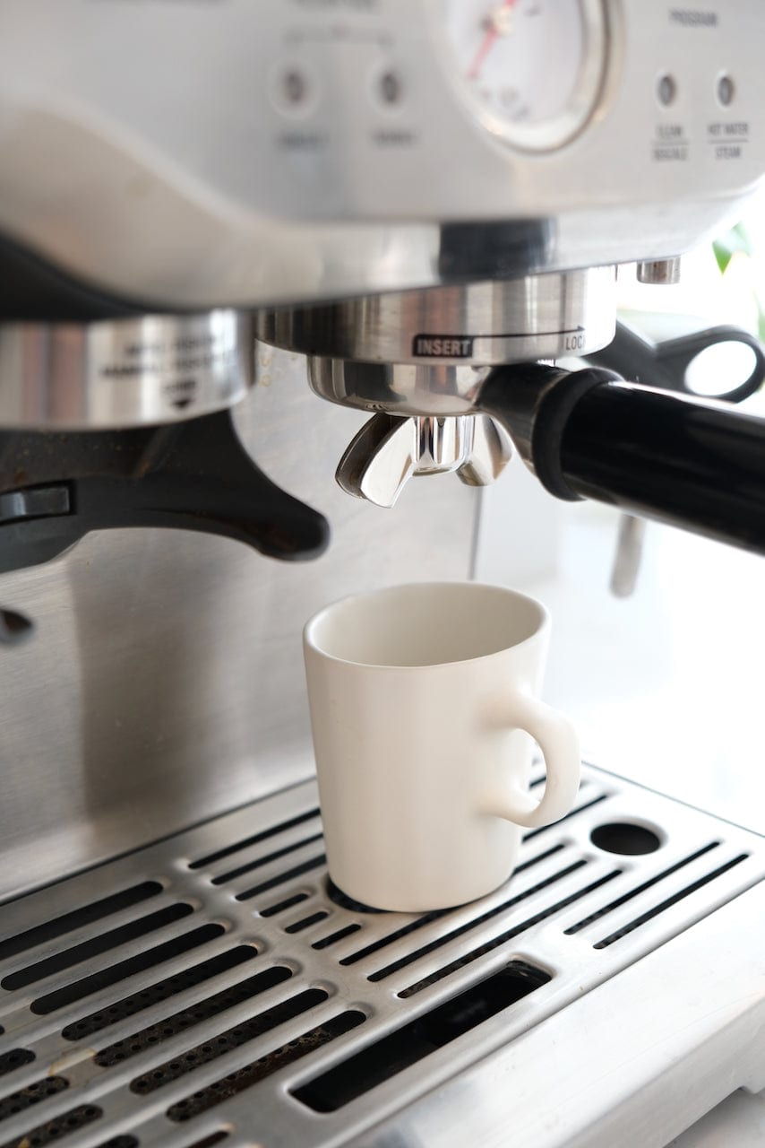 espresso mug on a coffee maker
