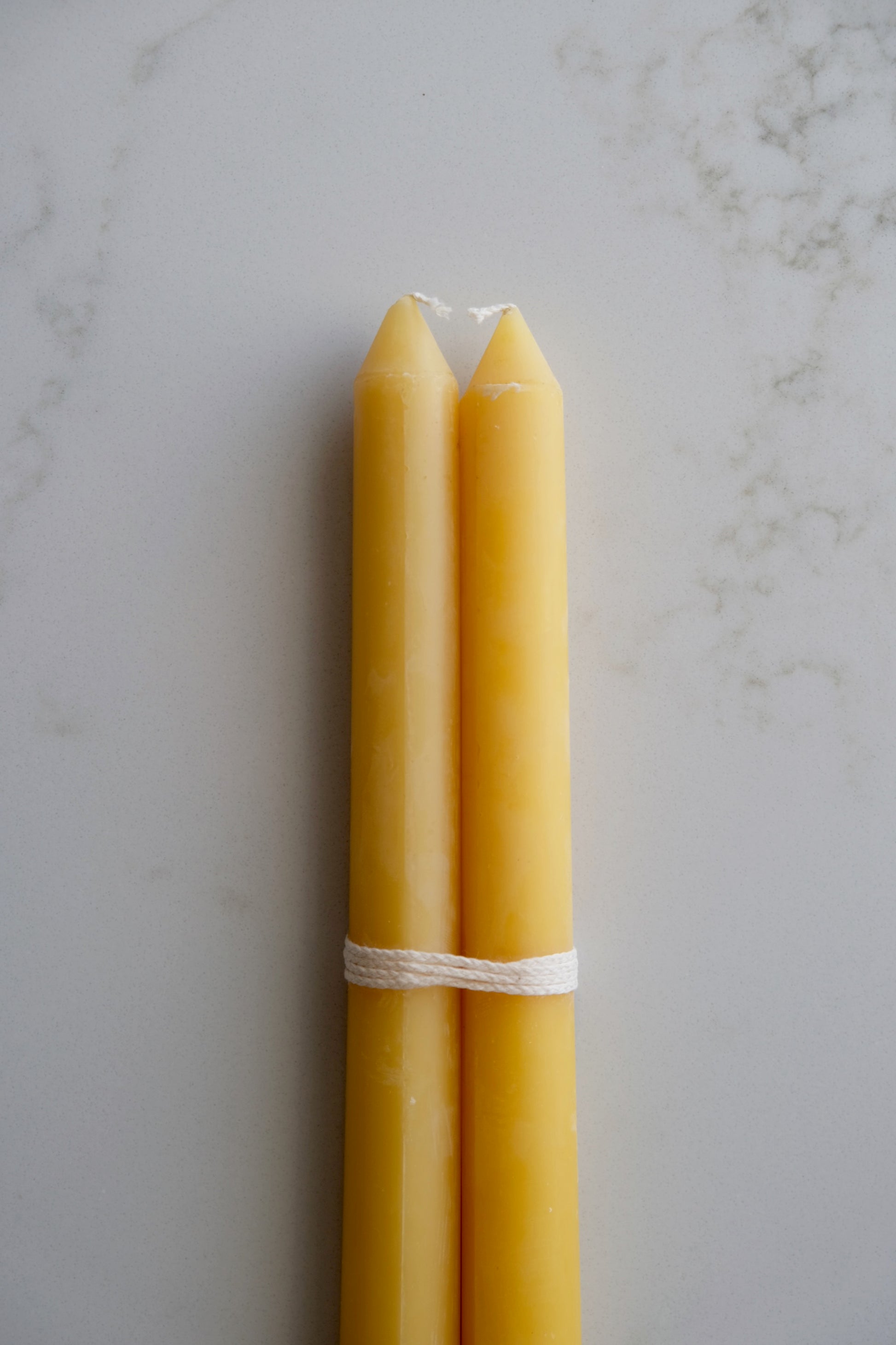 zoomed view of beeswax taper candles