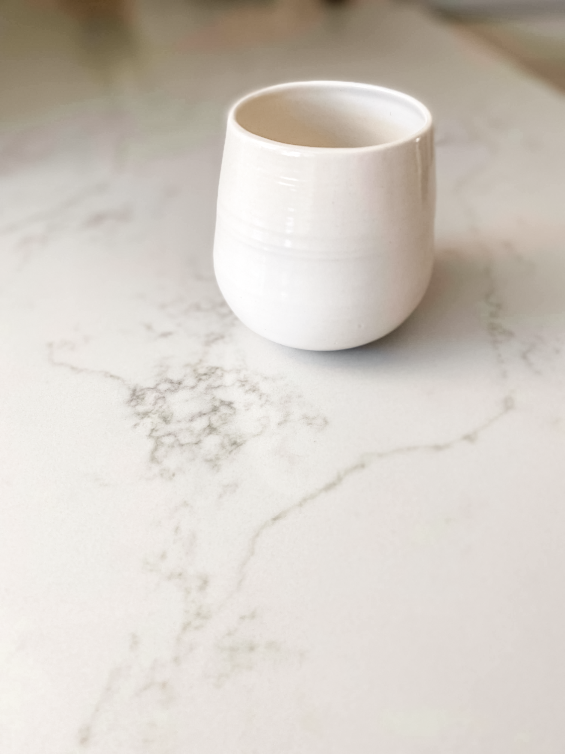White ceramic tumbler