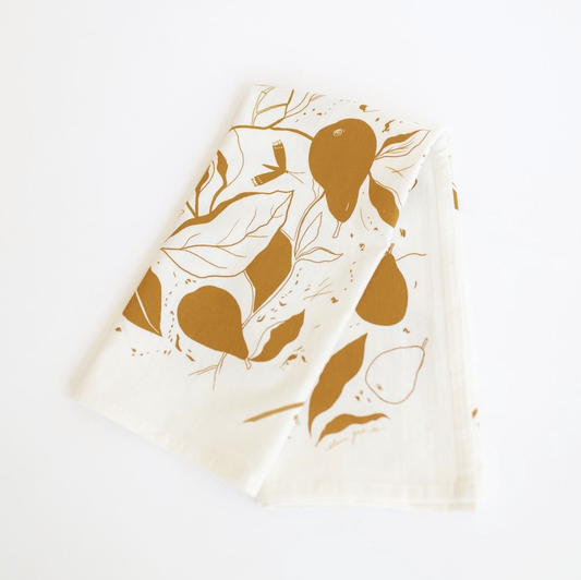 Pears tea towel folded with a white background
