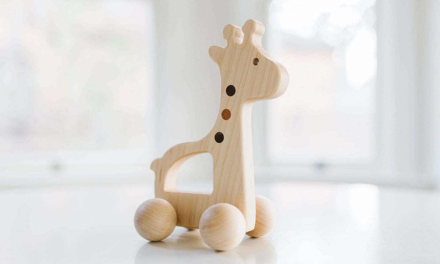 solid wood giraffe push toy
