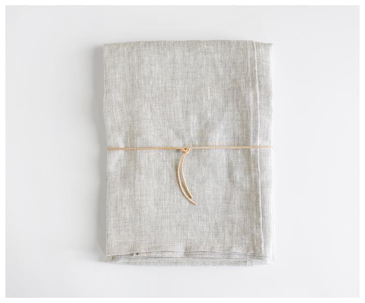 Folded Oatmeal Linen Tablecloth with leather string 